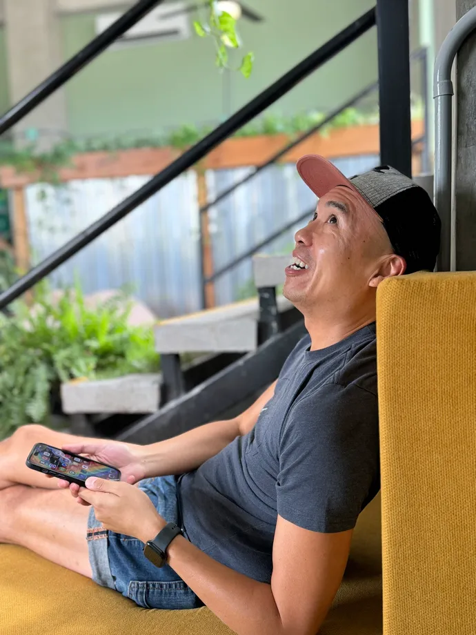 A person working comfortably at a desk with an ergonomic setup.