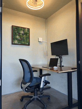 A person working at a treadmill desk, promoting an active and ergonomic workspace.